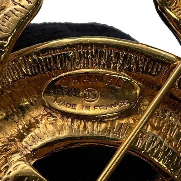 CHANEL Gold Logo Brooch